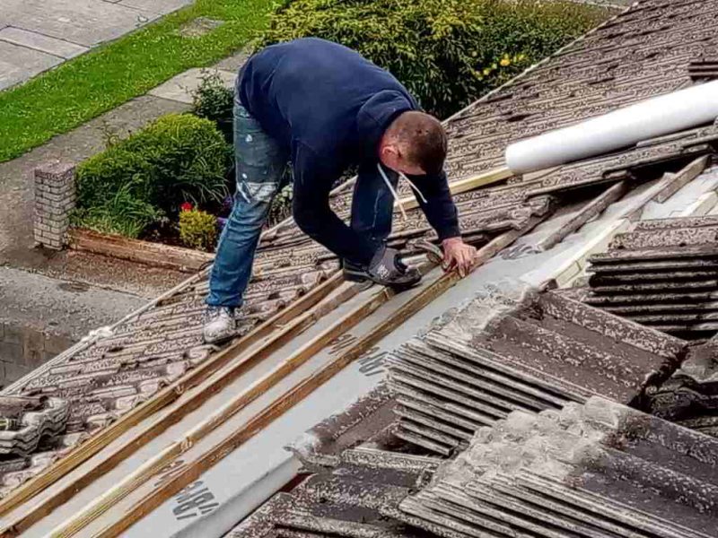 Relaying the tiles on a roof in Dublin